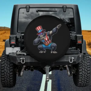 Dabbing gorilla wearing Uncle Sam hat and American flag tank top on spare tire cover, no camera hole