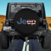 Jeep flag wordmark logo spare tire cover black background no camera hole
