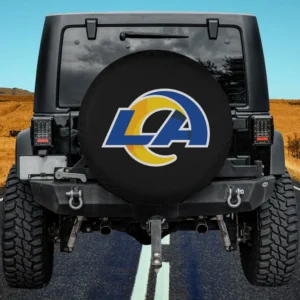 Los Angeles Rams blue and yellow NFL spare tire cover on Jeep with no camera hole