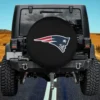 New England Patriots logo on black spare tire cover without camera hole