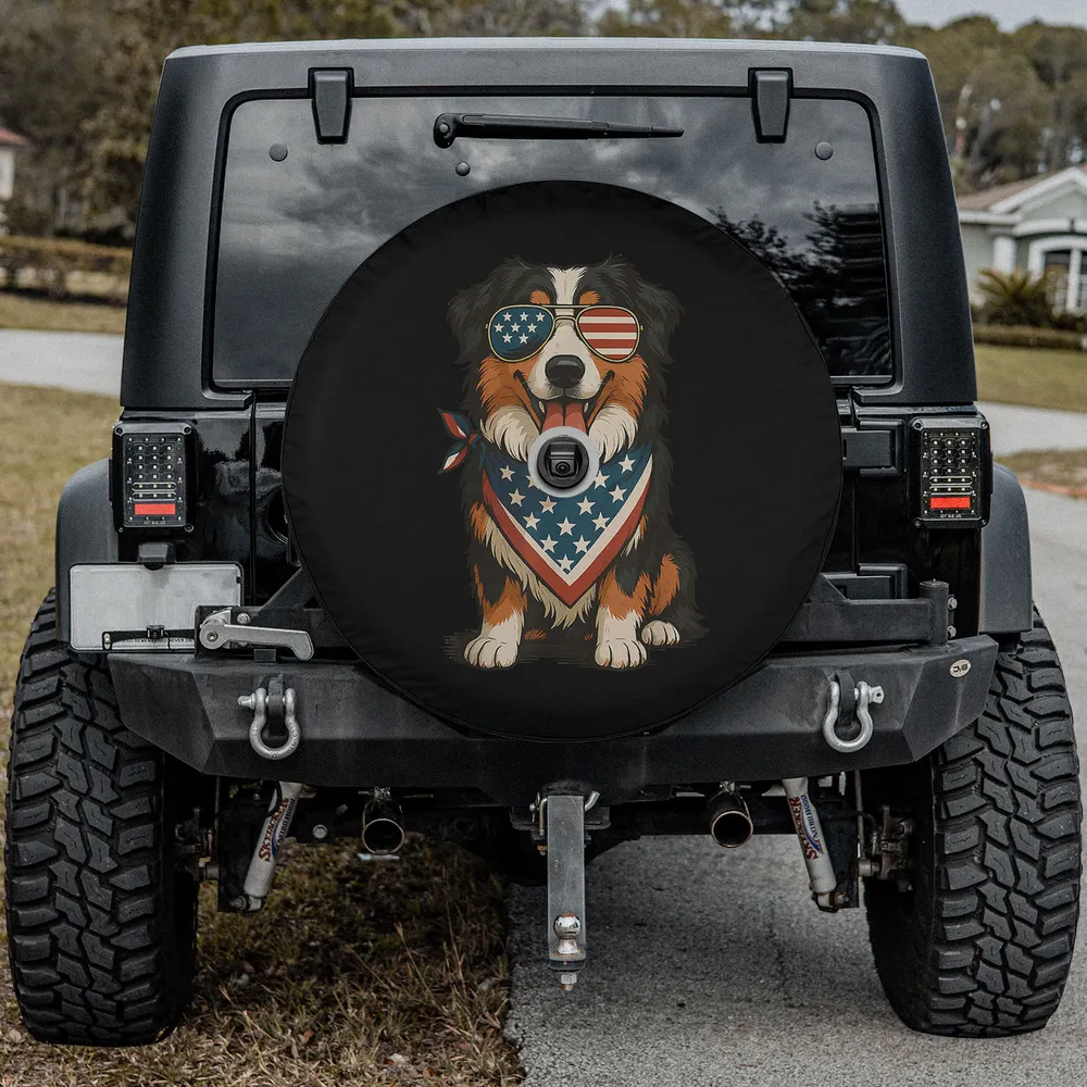 Australian Shepherd dog with patriotic sunglasses and bandana spare tire cover, with camera hole
