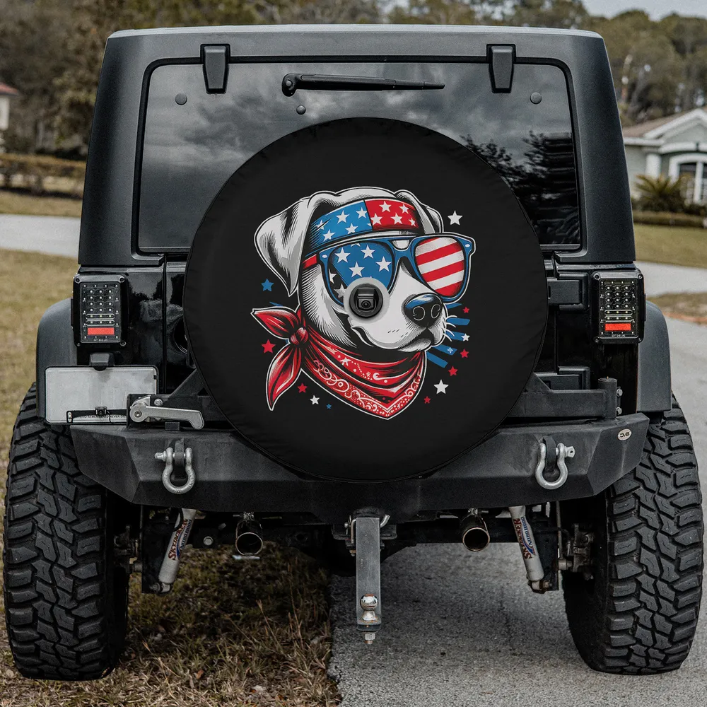 Dog with American flag sunglasses and red bandana spare tire cover, with backup camera hole