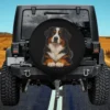 Cute dog lover Bernese Mountain Dog paws spare tire cover on Jeep, black background