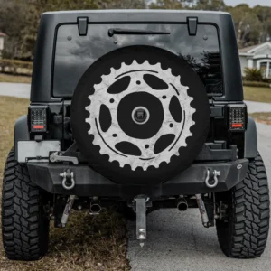 Bike sprocket gear vintage minimalist spare tire cover with backup camera hole on Jeep