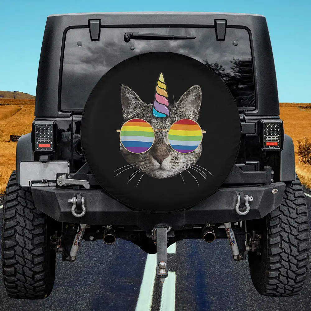 caticorn rainbow glasses cat spare tire cover with unicorn horn and rainbow sunglasses on black background