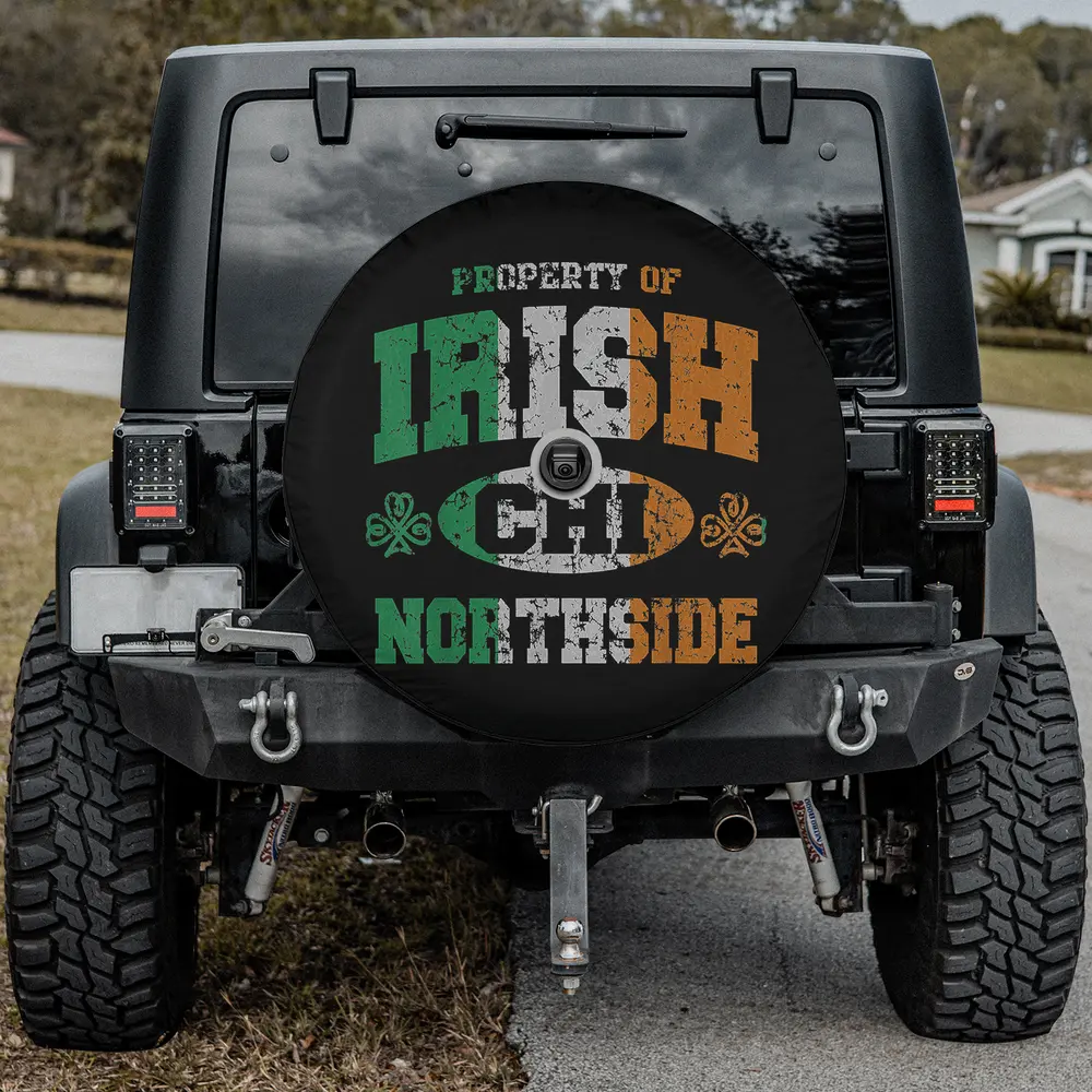 Distressed Irish flag Northside shamrock spare tire cover on Jeep with camera hole