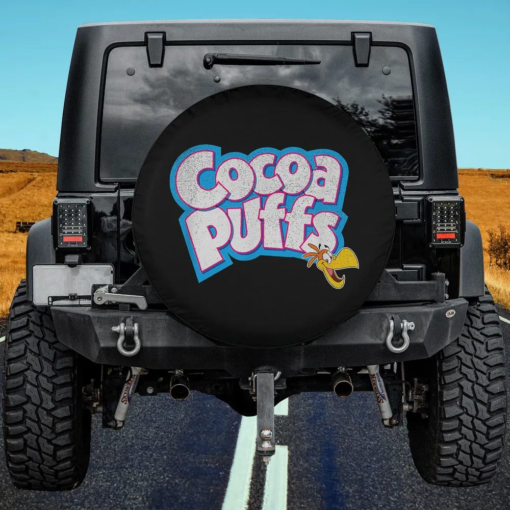 Distressed Cocoa Puffs logo with Sonny the Cuckoo Bird on spare tire cover, no camera hole