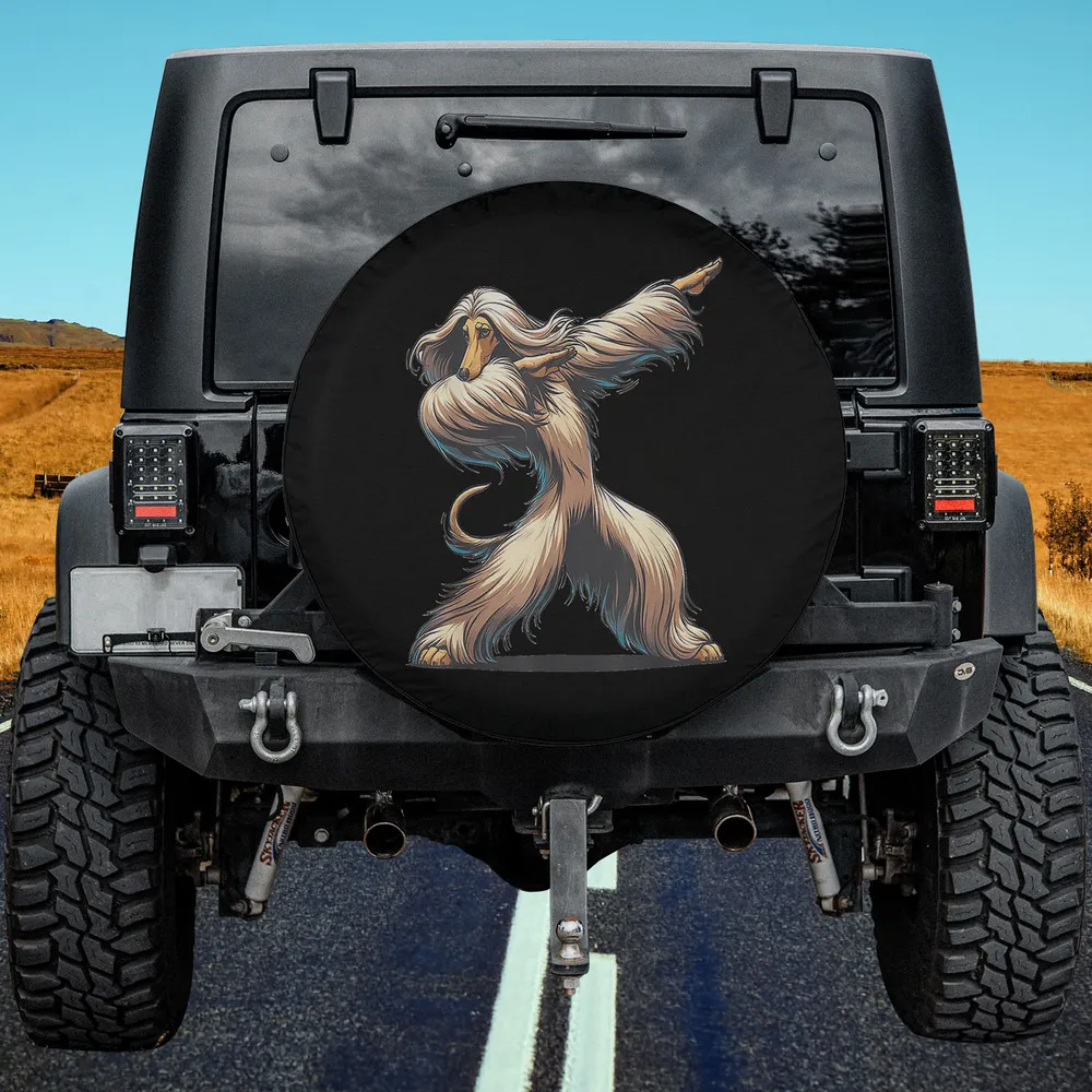 dab afghan hound dancing dabbing dog spare tire cover on Jeep in field