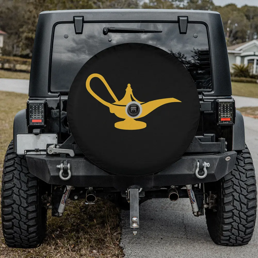 Gold magic lamp silhouette on black cat spare tire cover with camera hole