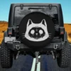 Gothic occult cross dripping eyes cat spare tire cover on Jeep with no camera hole