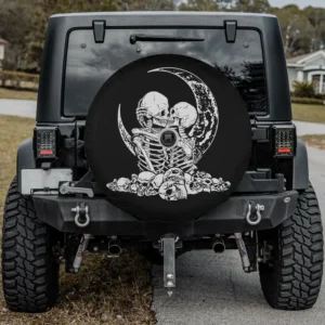 Halloween spare tire cover with kissing skeleton lovers, crescent moon, skulls, and camera hole