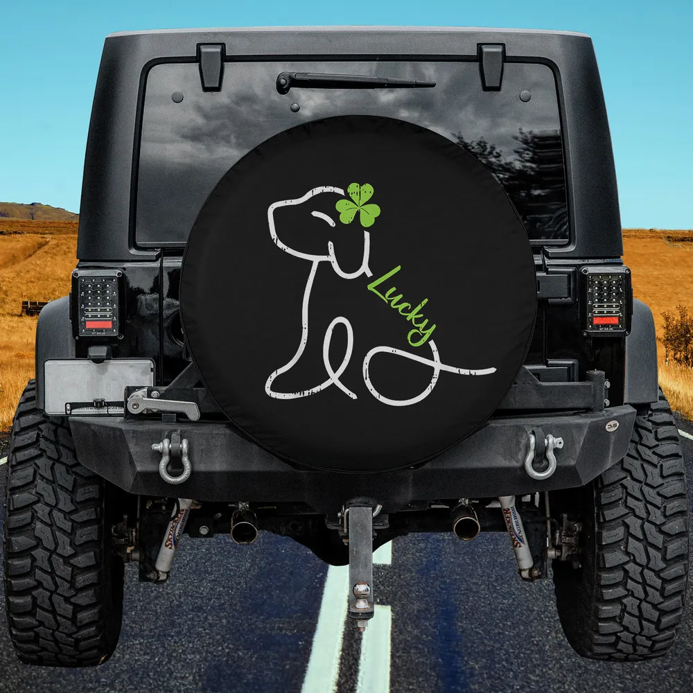 Line art dog shamrock lucky text spare tire cover for Jeep, black background, no camera hole