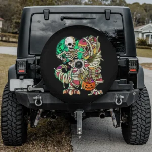 Moon skeleton mummy dinosaur Halloween spare tire cover with backup camera hole, pumpkin candy, on SUV