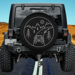 mountain trail jeep sun line art spare tire cover on black SUV outdoors
