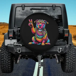 Peace sign tie dye pit bull dog spare tire cover on Jeep in outdoor setting