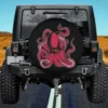 Pink octopus with swirling tentacles sea inhabitant spare tire cover on Jeep, no camera hole