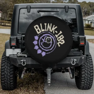 Purple arrows smiley Blink-182 logo spare tire cover with backup camera hole for travel trailer