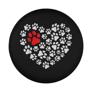 Heart made of white and red dog paw prints on black spare tire cover