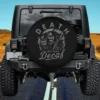 Skeleton holding coffee mug and scythe with death before decaf text on vintage Halloween spare tire cover, no camera hol