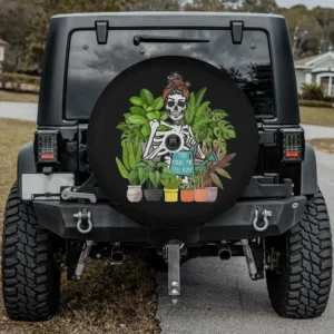 skeleton with red headband and potted plants spare tire cover with camera hole
