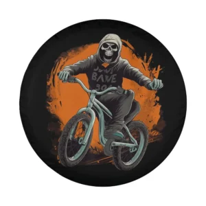 Skeleton stuntman on teal stunt bike with orange Halloween background for tire cover