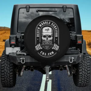 Skull with beard and cap gripping steering wheel on funny offroad spare tire cover, no camera hole