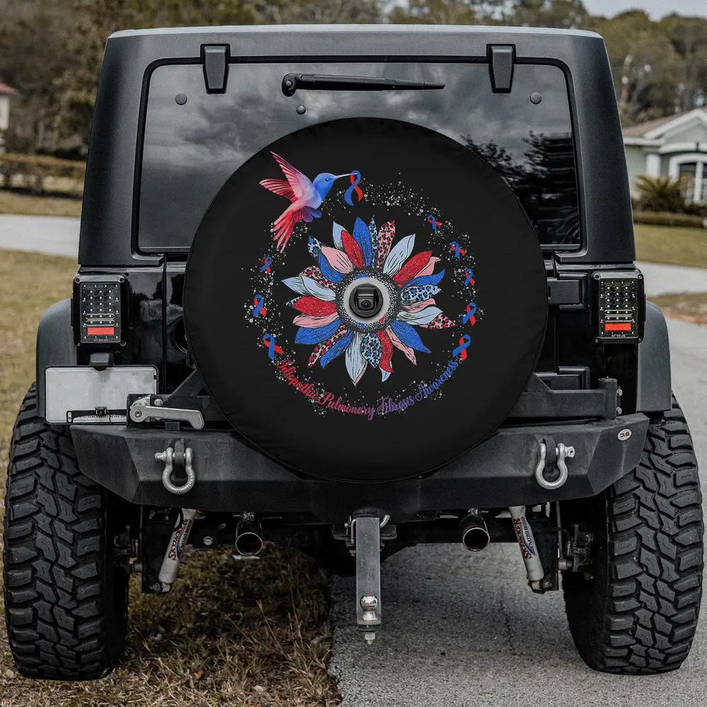 Spare tire cover with sunflower, hummingbird, red blue ribbon for idiopathic pulmonary awareness and camera hole