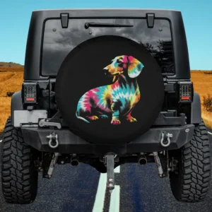 Tie dye zigzag dachshund dog spare tire cover on Jeep in field
