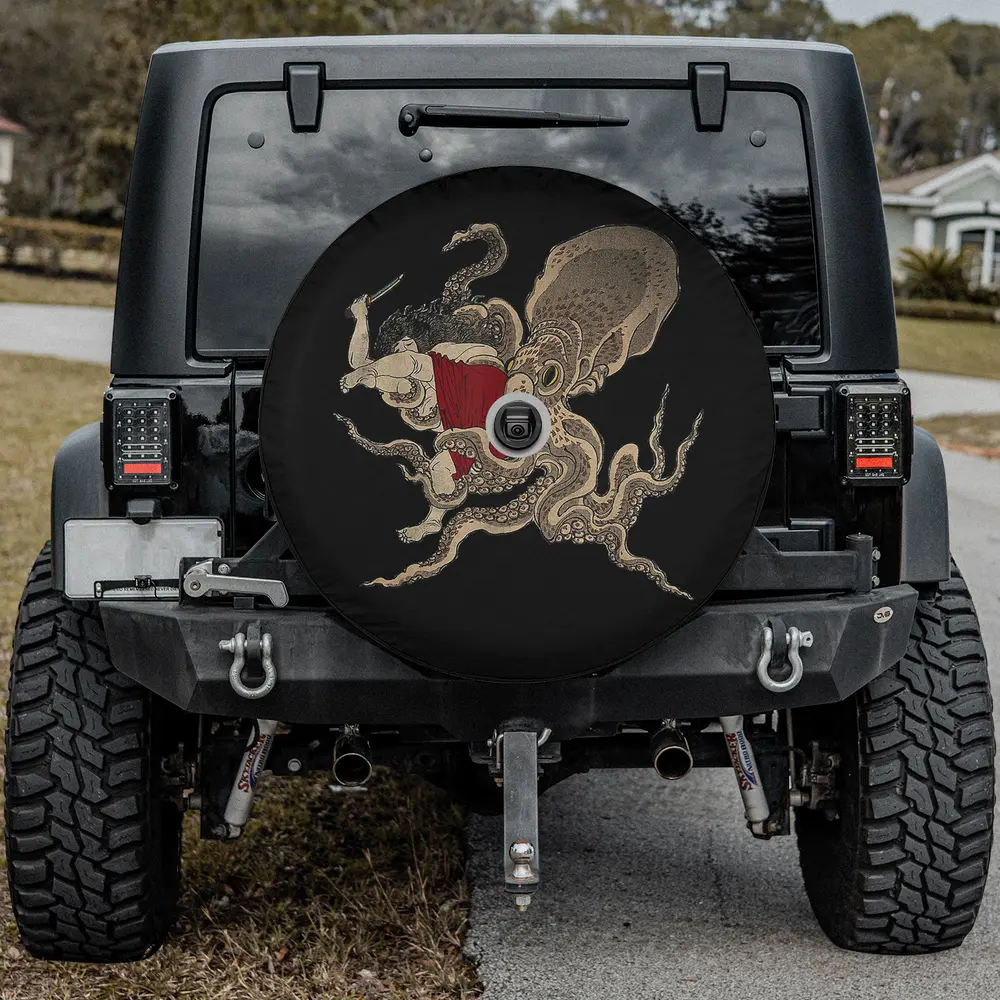Spare tire cover with vintage octopus and woman in red dress, backup camera hole