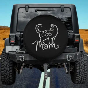 White line art cat with green eye and cat mom humor on spare tire cover no camera hole