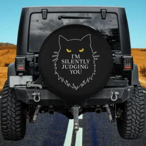 yellow eyes black cat silhouette silently judging spare tire cover no camera hole