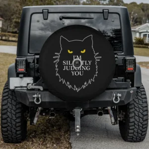 yellow eyes black cat silhouette silently judging spare tire cover with camera hole