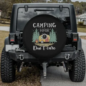Cartoon camper trailer and pine trees with funny camping quote spare tire cover with camera hole