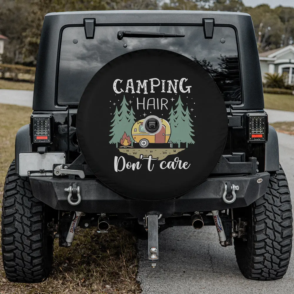 Cartoon camper trailer and pine trees with funny camping quote spare tire cover with camera hole