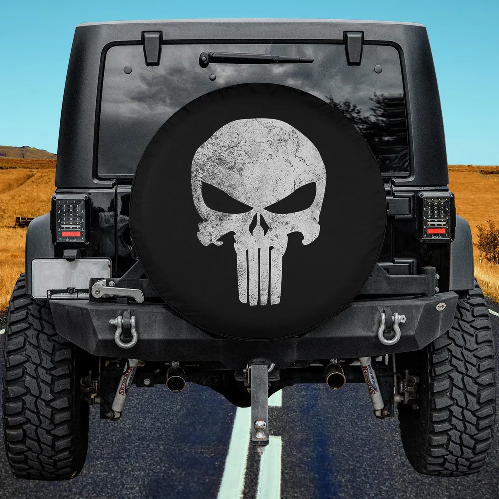 Distressed Punisher skull Marvel Comics spare tire cover on Jeep with no camera hole