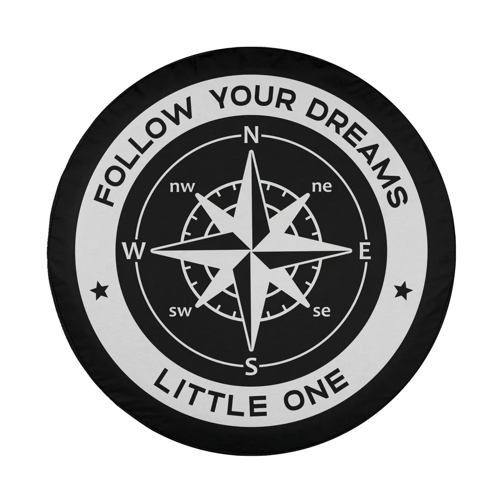 Compass rose and Follow Your Dreams Little One text graphic for camping spare tire cover