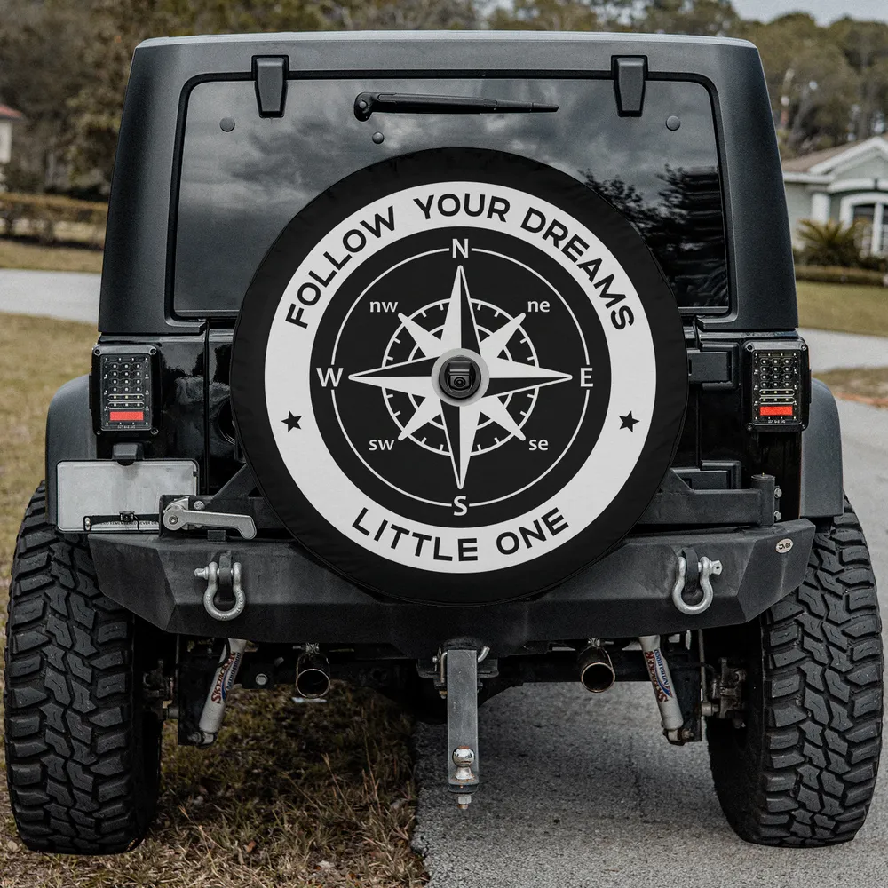 Follow Your Dreams compass camping spare tire cover, compass rose and motivational text, with backup camera hole