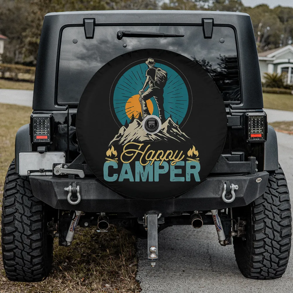 Happy Camper Hiking Scene Camping Spare Tire Cover with hiker, sunrise, mountains, and camera hole