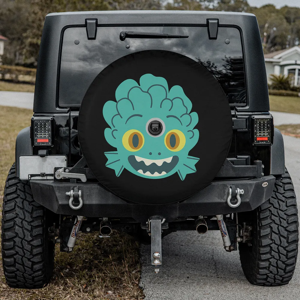 Aqua sea monster face with yellow eyes Luca spare tire cover with camera hole