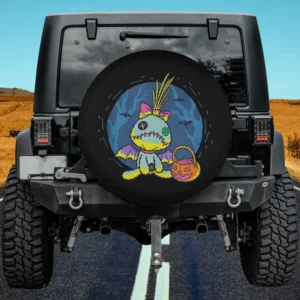 Scrump doll in bat costume with jack-o-lantern on Halloween spare tire cover for Jeep or SUV