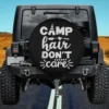 teepee arrow camp hair don't care spare tire cover with bold white text and arrows for camping SUVs
